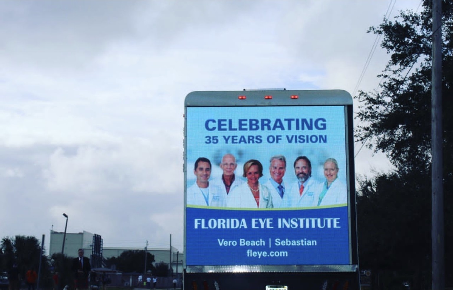 Florida Eye Institute anniversary creative on the rear LED screen