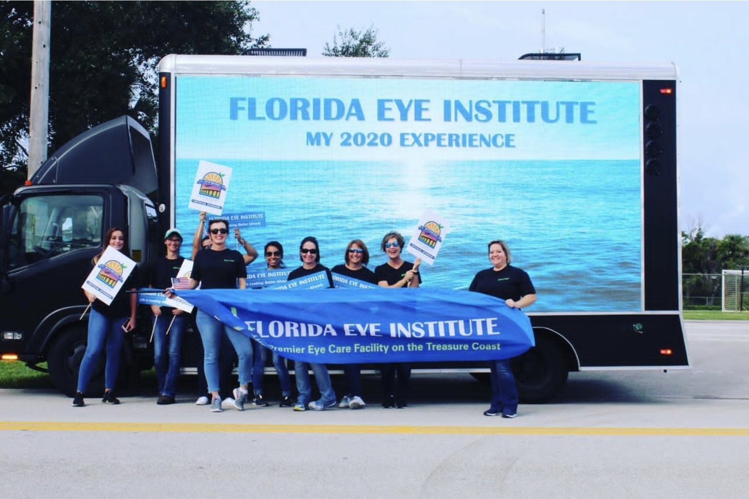 Florida Eye Institute team with the digital mobile billboard truck