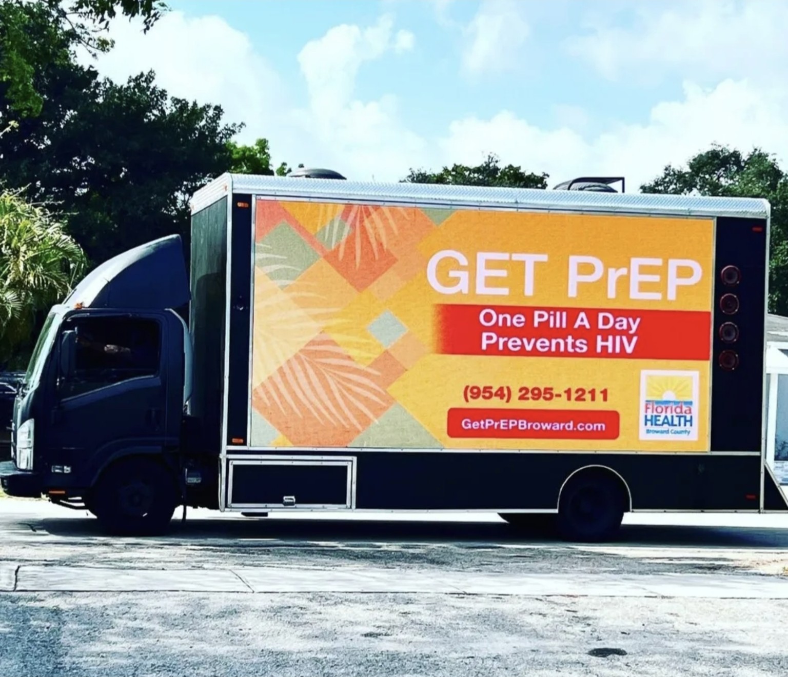 Digital mobile billboard truck displaying Florida Health Broward County HIV prevention awareness creative
