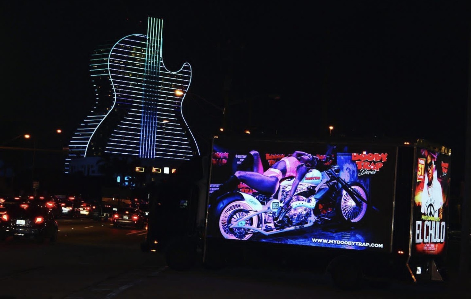 Nighttime digital mobile billboard campaign near the Guitar Hotel