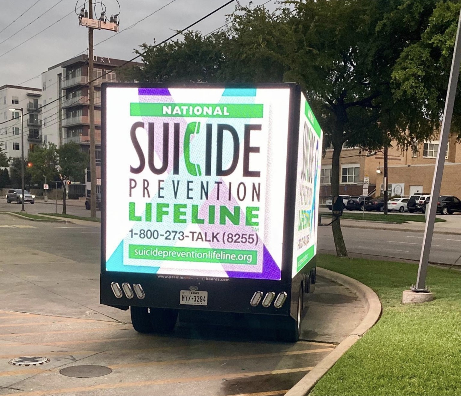 Digital mobile billboard truck displaying National Suicide Prevention Lifeline awareness messaging