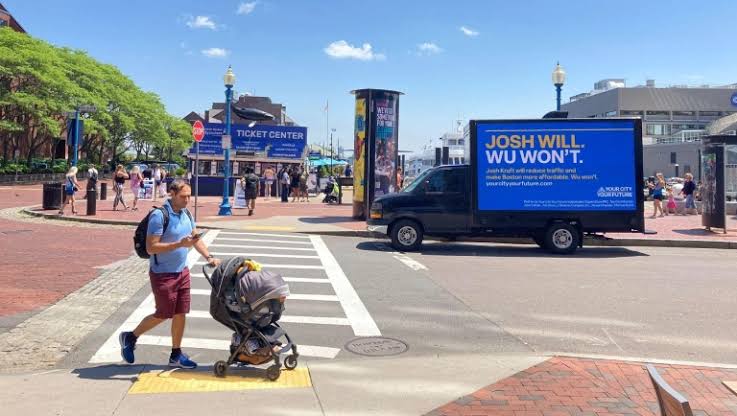 Digital mobile billboard displaying a nonpartisan voter participation message
