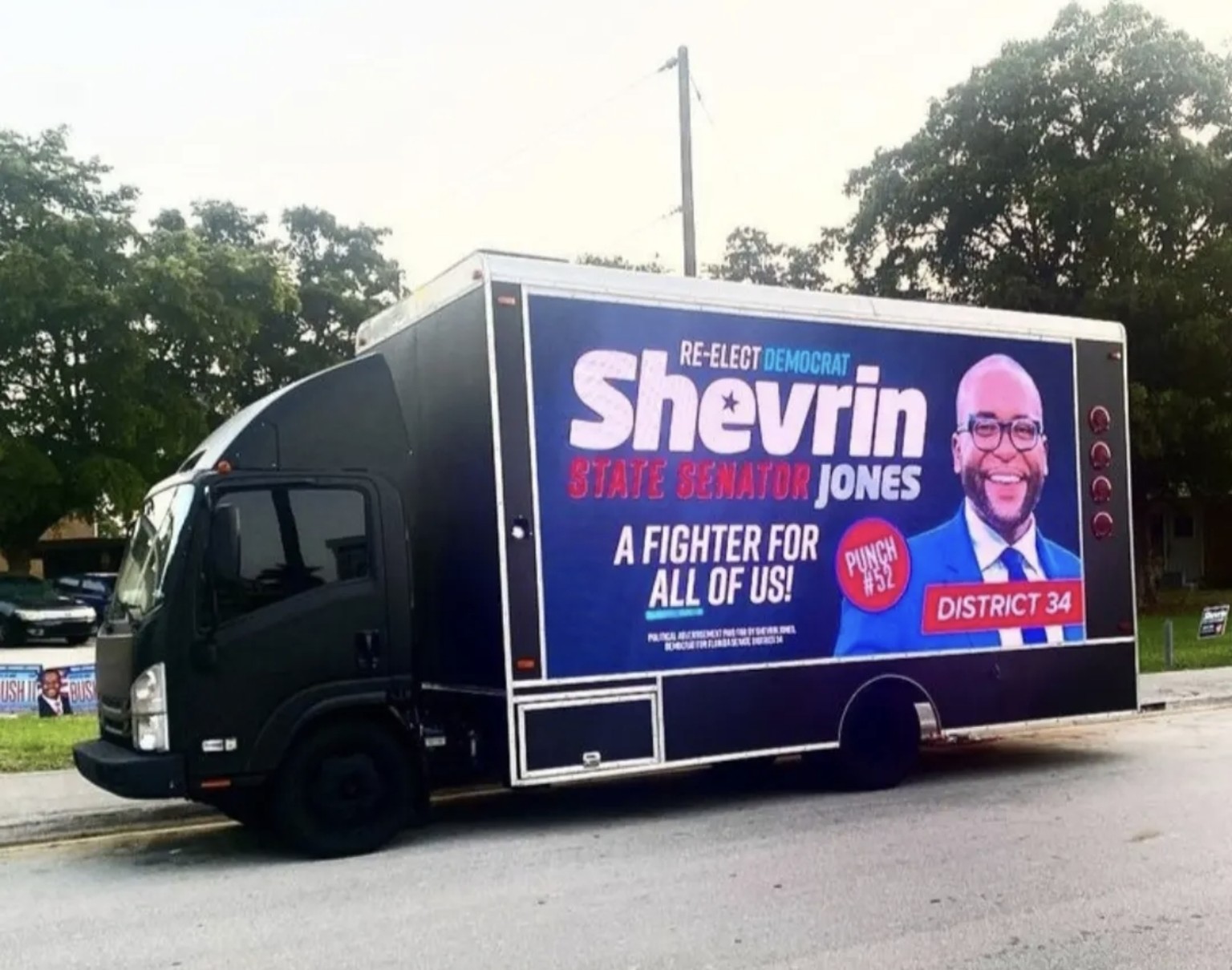 Digital mobile billboard truck displaying Shevrin Jones campaign creative